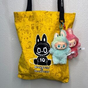 Yellow Monsters by Monsters Tote Bag